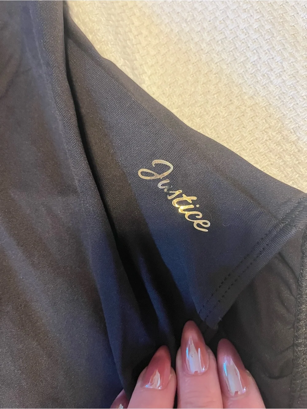 Justice Black One-Piece Swimsuit with Gold Script Logo